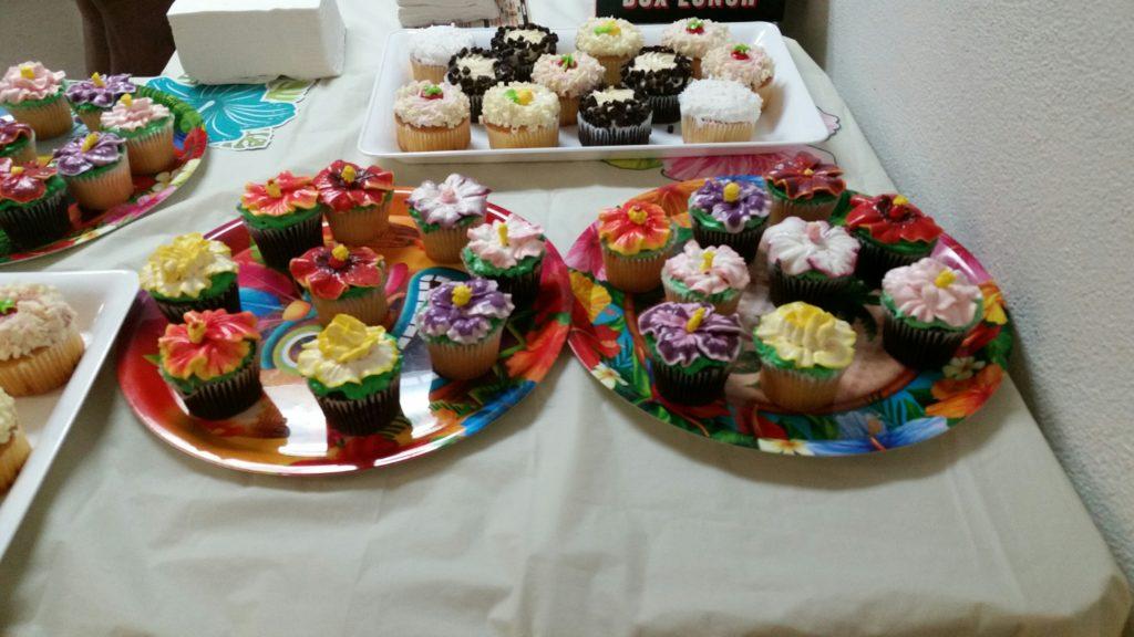 Colorful sushi platters with various rolls and garnishes.