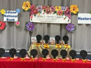 A colorful Day of the Dead altar with skull decorations and marigolds.