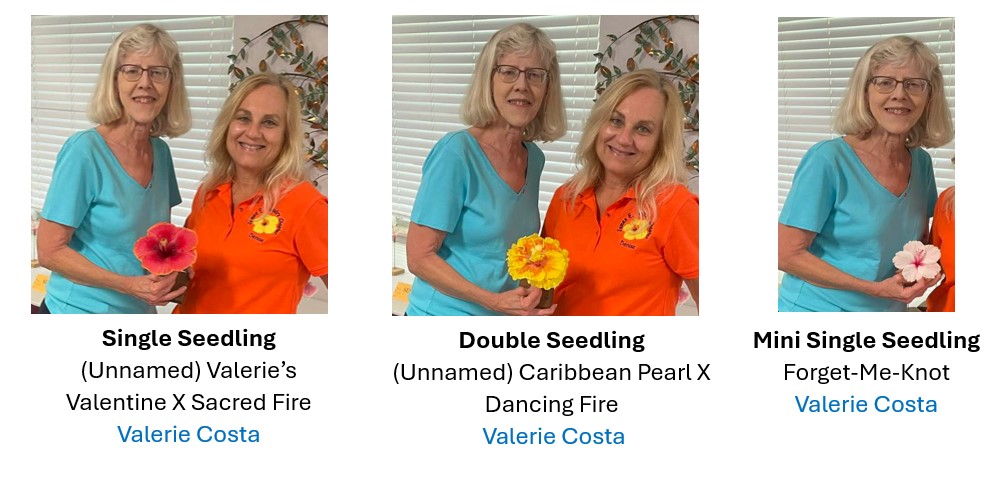 Two women smiling, holding a certificate in a celebratory setting.